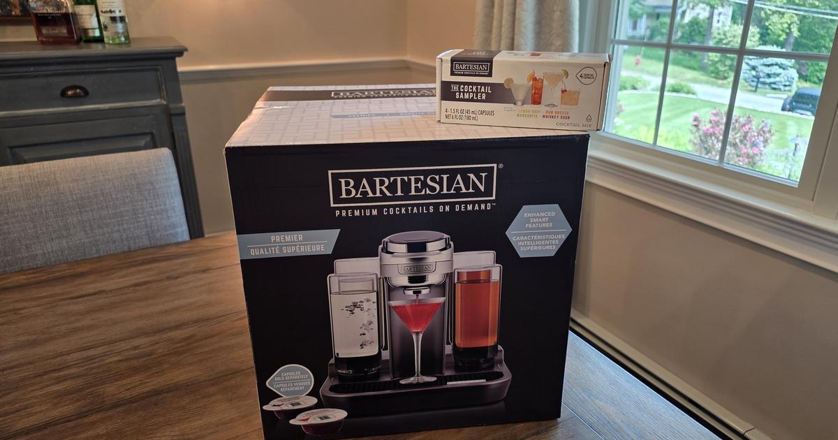 An unopened Bartesian Premier box on a dining table by a sunny window