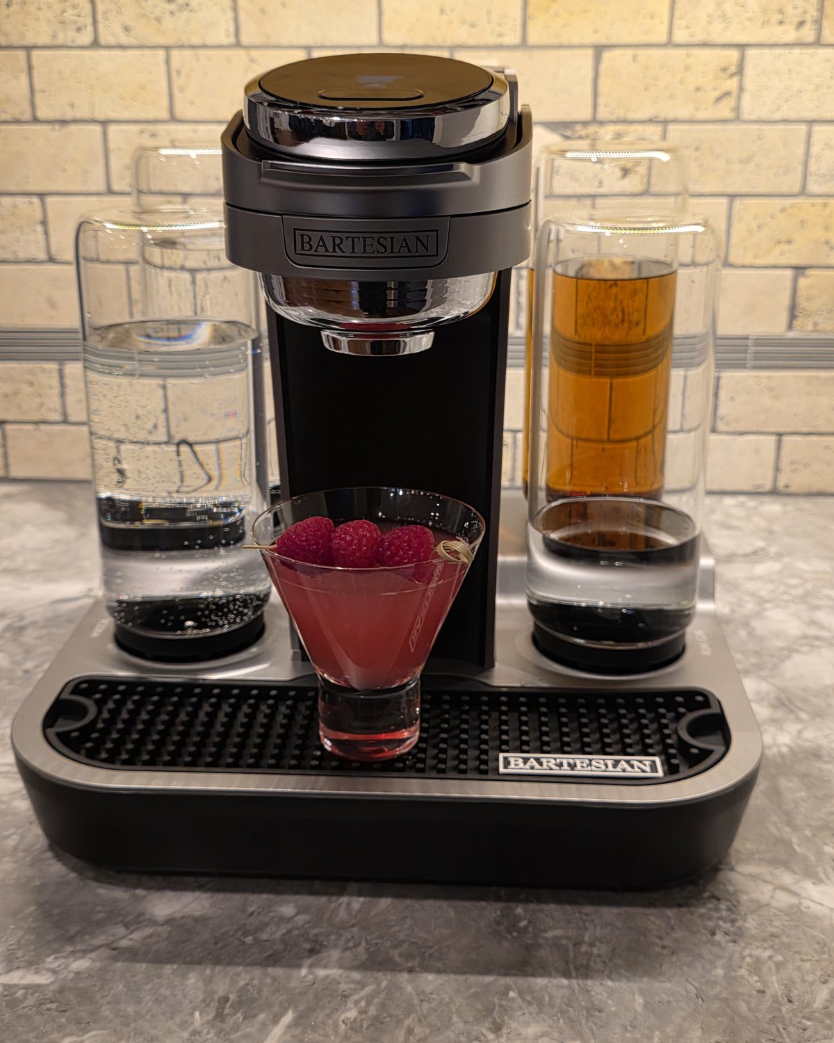 Bartesian Raspberry Ginger Gimlet pod cocktail with raspberry garnish